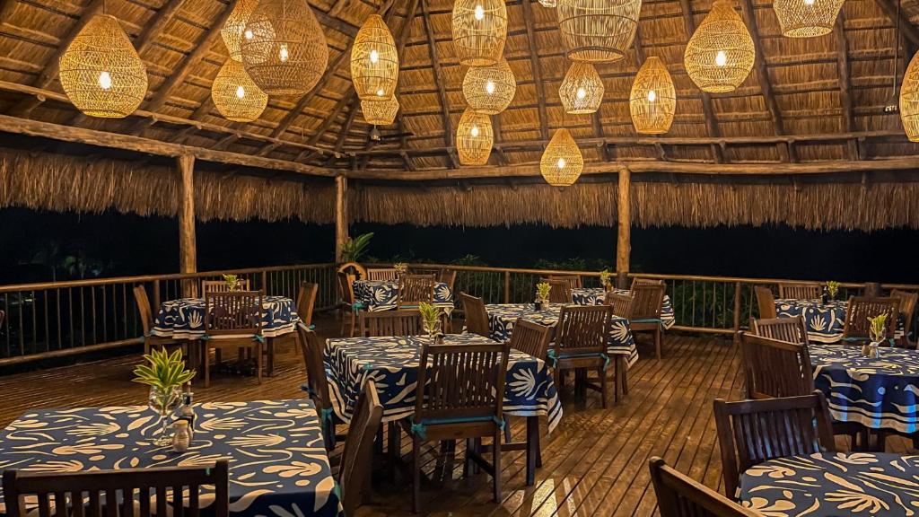 Un restaurante u otro lugar para comer en Aite Eco Resort
