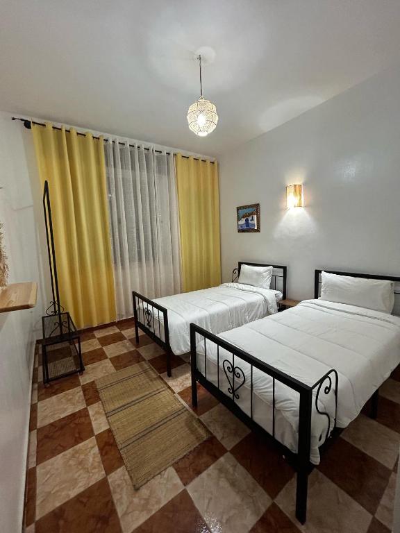 Letto o letti in una camera di Hotel Al Manar