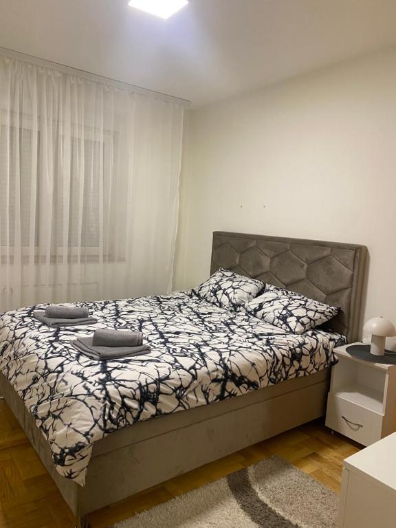 Postel nebo postele na pokoji v ubytování Apartman Filip2