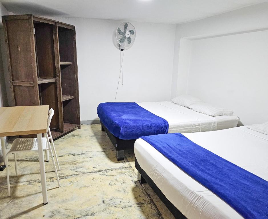 Postel nebo postele na pokoji v ubytování Maisant Hostel