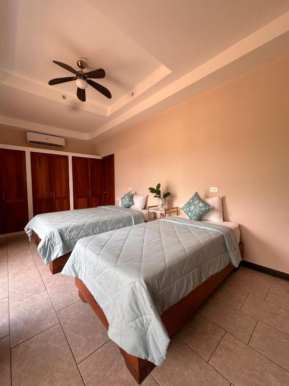 Postel nebo postele na pokoji v ubytování Hotel Amira