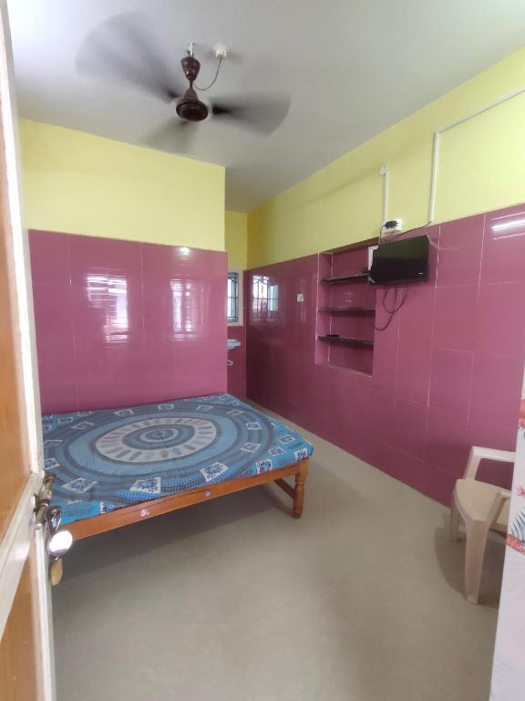 Postel nebo postele na pokoji v ubytování Felix Residency