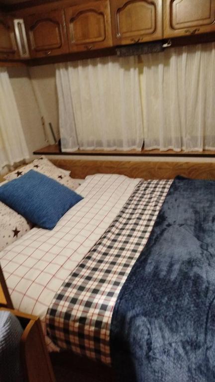 Postel nebo postele na pokoji v ubytování Caravana en La Sierra