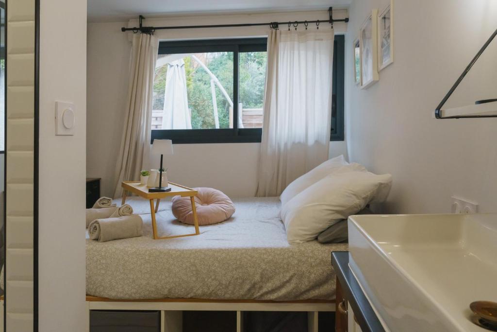 Postel nebo postele na pokoji v ubytování Cocon Classé 3 Etoiles - Love et Détente - SPA