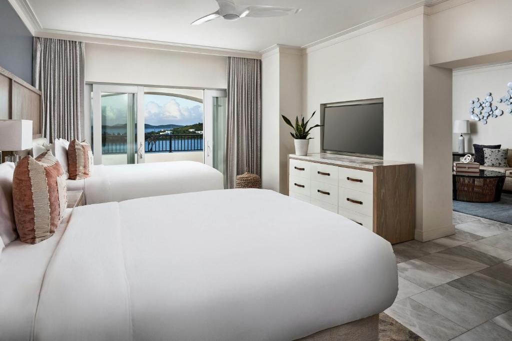 Postel nebo postele na pokoji v ubytování The Ritz-Carlton St. Thomas