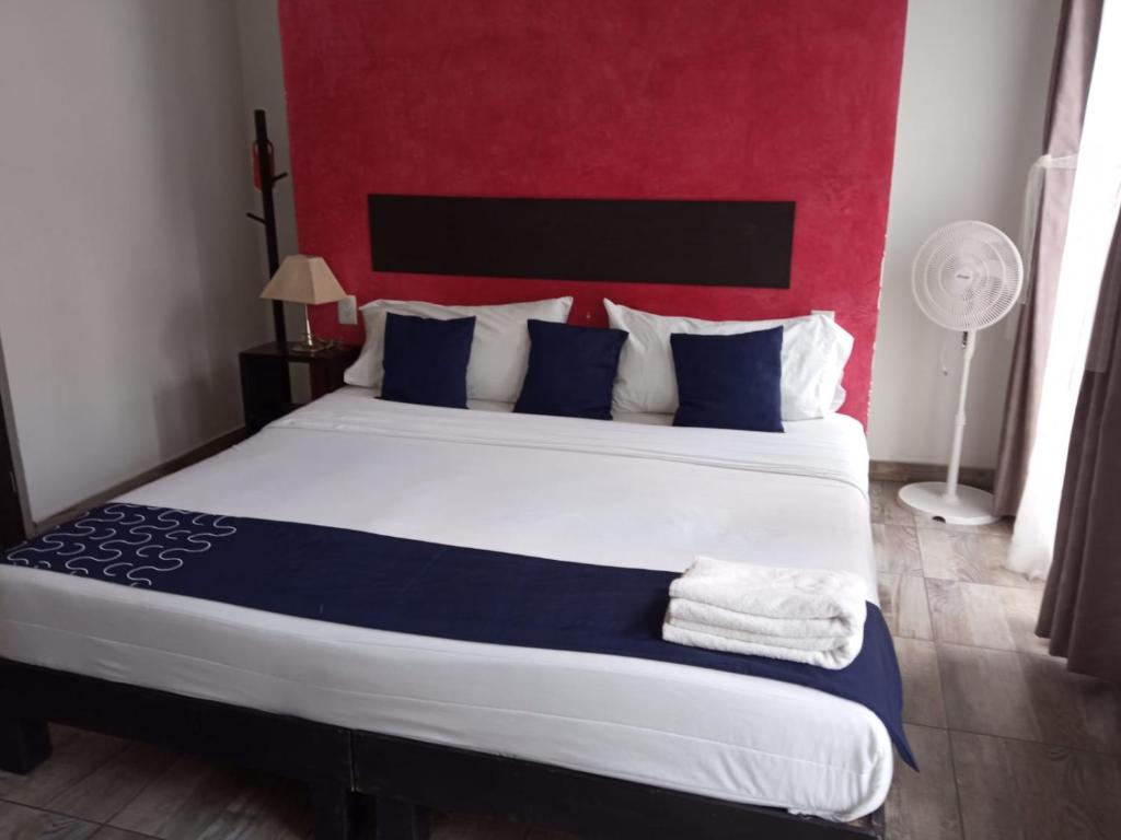 Postel nebo postele na pokoji v ubytování Hotel Gandag