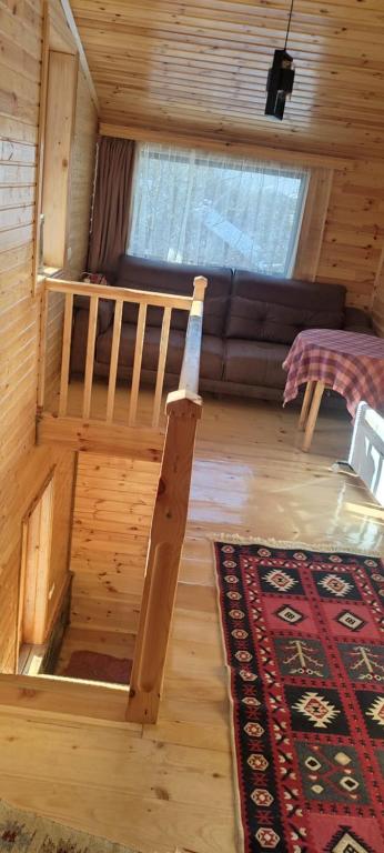 Area soggiorno di Ioane's Chalet