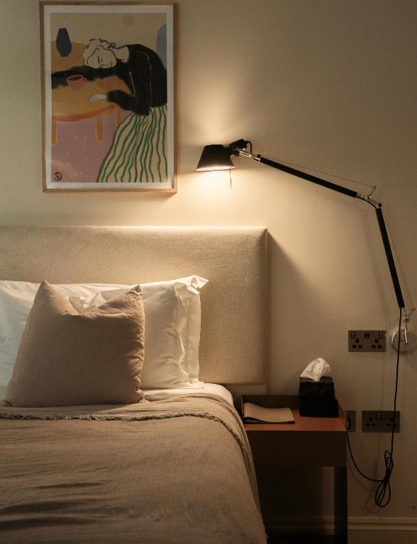 Postel nebo postele na pokoji v ubytování Leighton House - Boutique Guesthouse