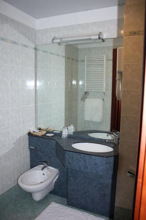 Koupelna v ubytování Hotel Tre Denti