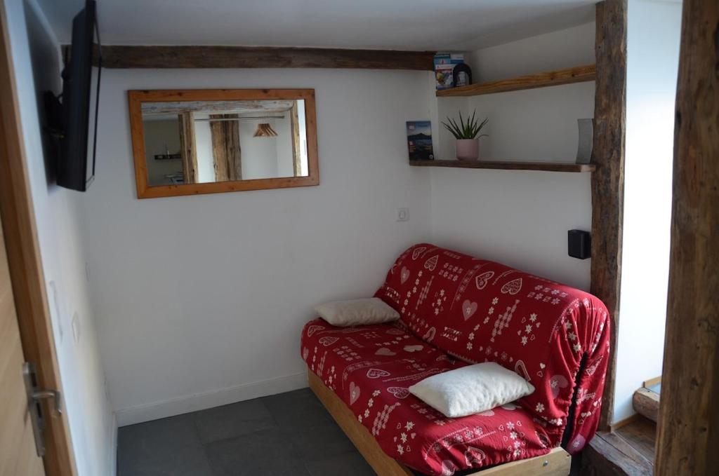 Posezení v ubytování L'Alpage des pistes - Chalet skis aux pieds à La Plagne