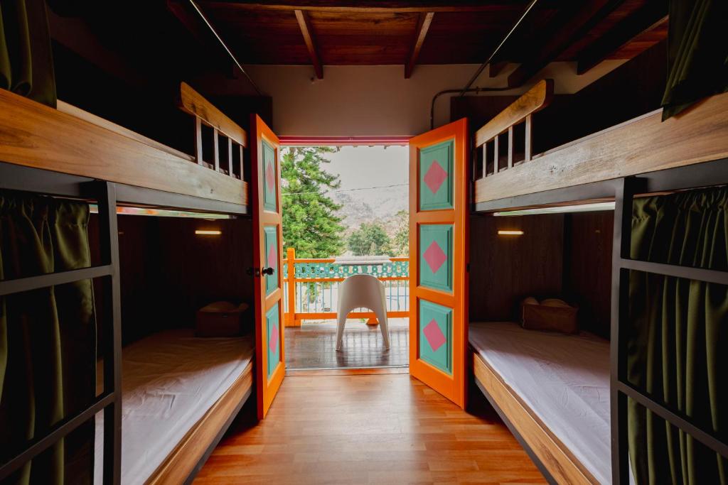 Postel nebo postele na pokoji v ubytování Isla de pascua - Jardín - Hostel