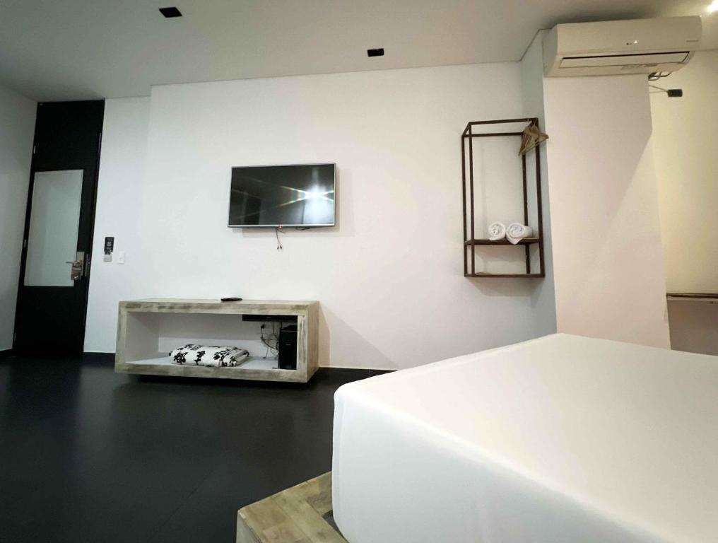TV a/nebo společenská místnost v ubytování Graffity Hotel Med