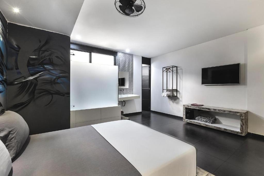 TV a/nebo společenská místnost v ubytování Graffity Hotel Med
