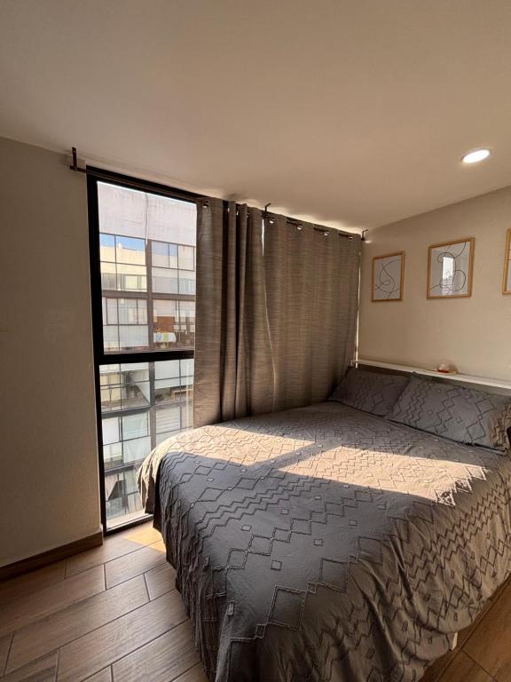 Postel nebo postele na pokoji v ubytování Habitación privada en departamento compartido centro de la cuidad de México CDMX Buenavista, cerca de reforma revolución zocalo