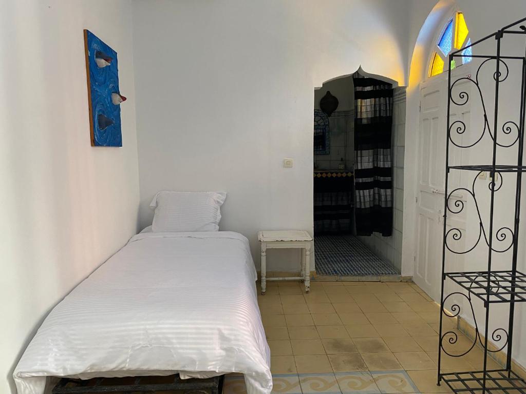 Postel nebo postele na pokoji v ubytování Riad Safi - maison historique