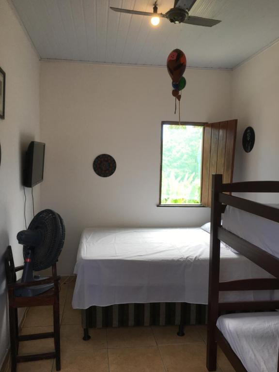 Postel nebo postele na pokoji v ubytování Hostel Bahia Boa