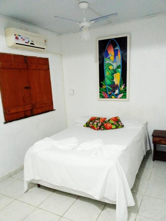 Postel nebo postele na pokoji v ubytování Hostel Bahia Boa