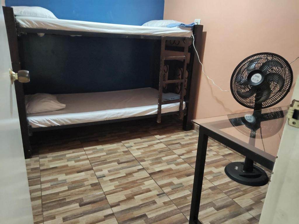 Postel nebo postele na pokoji v ubytování Hostal Avanza