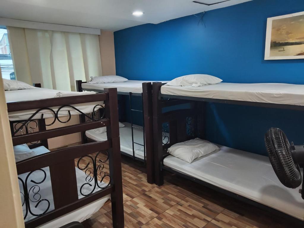 Postel nebo postele na pokoji v ubytování Hostal Avanza