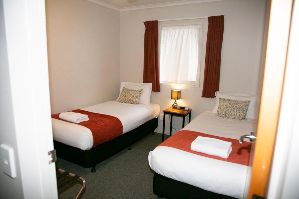Postel nebo postele na pokoji v ubytování Bella Vista Motel Hamilton