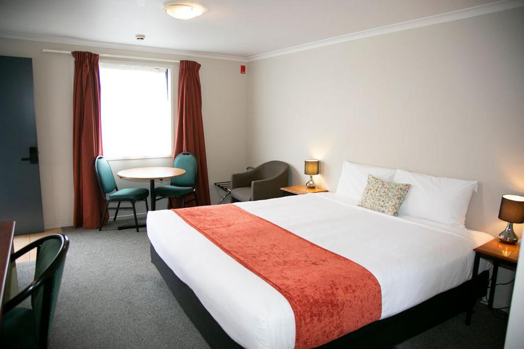 Postel nebo postele na pokoji v ubytování Bella Vista Motel Hamilton