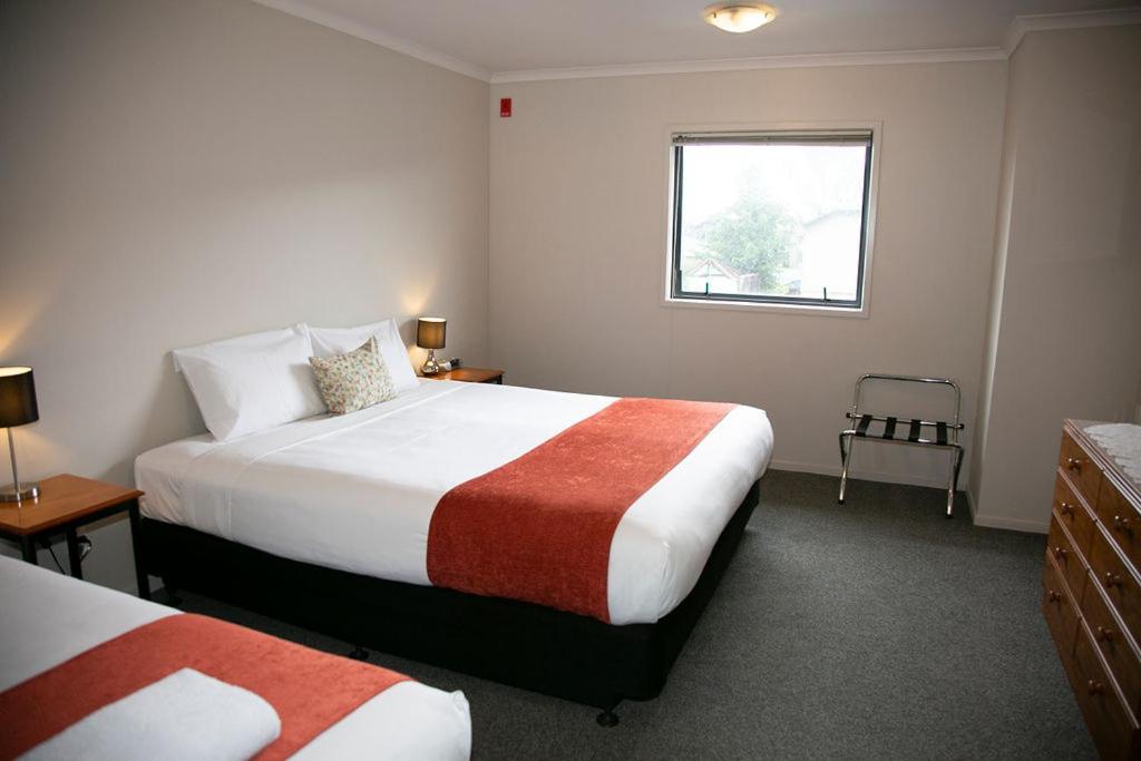 Postel nebo postele na pokoji v ubytování Bella Vista Motel Hamilton