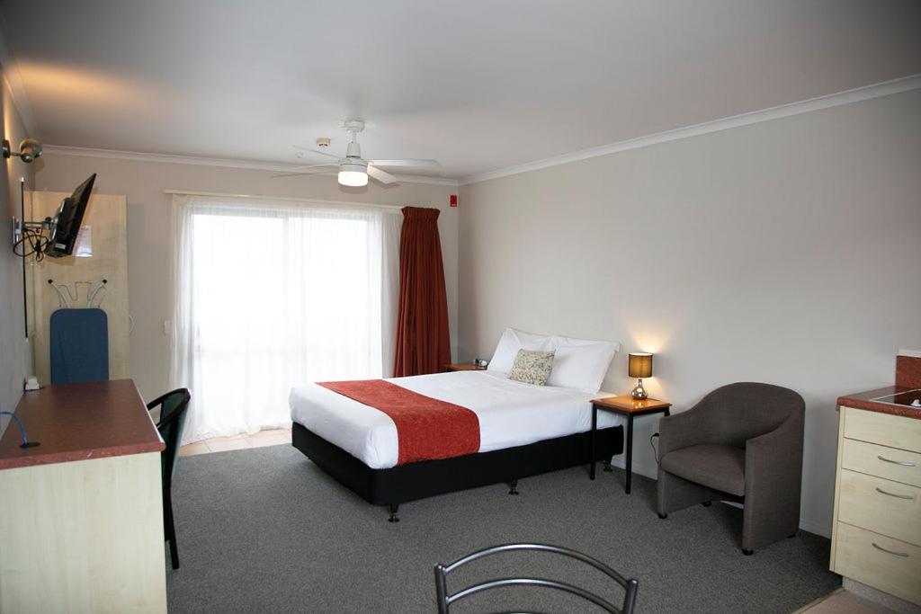Postel nebo postele na pokoji v ubytování Bella Vista Motel Hamilton