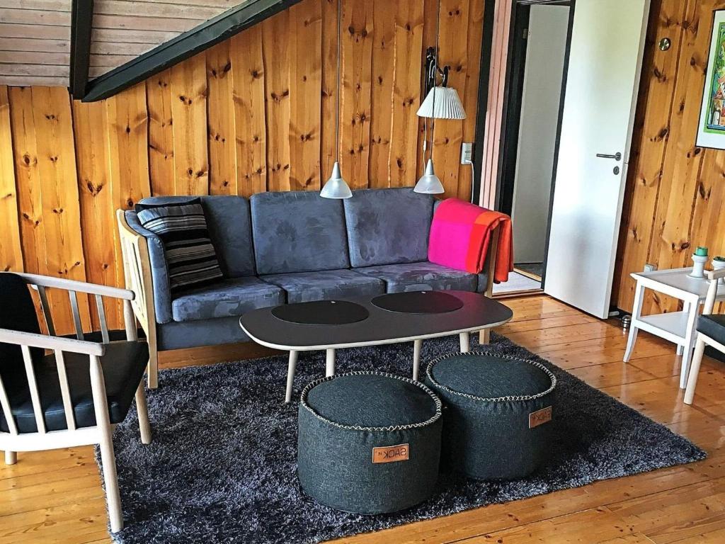 Posezení v ubytování Three-Bedroom Holiday home in Otterup 9