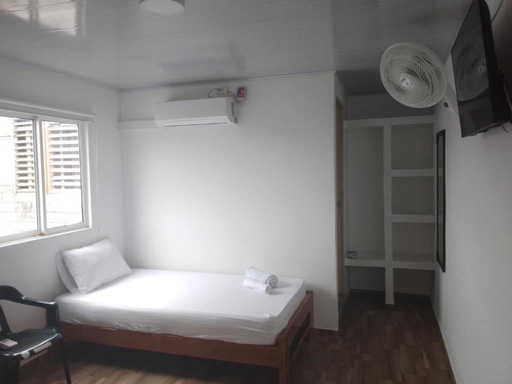 Postel nebo postele na pokoji v ubytování Hotel Melemar