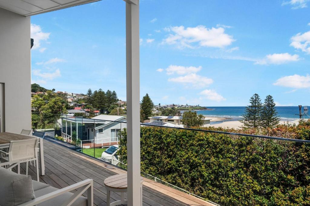 a view of the beach from the balcony of a house at Riverleigh, Gerroa in Gerroa