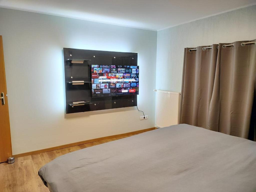 Postel nebo postele na pokoji v ubytování Modern 3 Bedroom Apartment near Useldange Castle