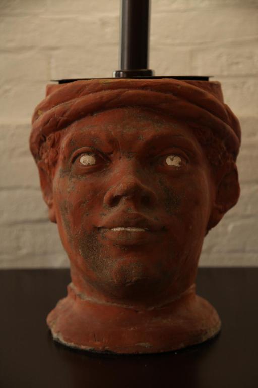 a statue of a bust of a man wearing a hat at B&B Casa Ruffino in Balestrate