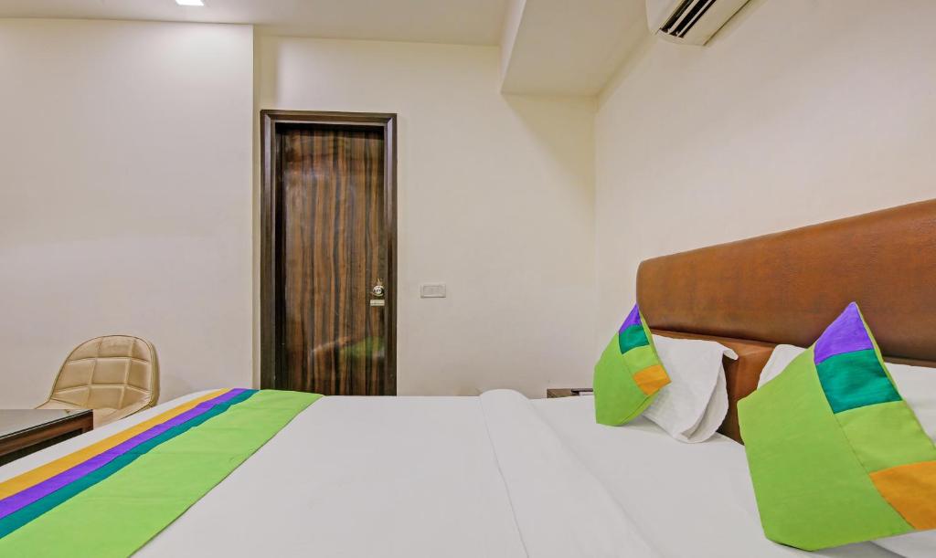 Postel nebo postele na pokoji v ubytování Itsy Hotels Prime Stay