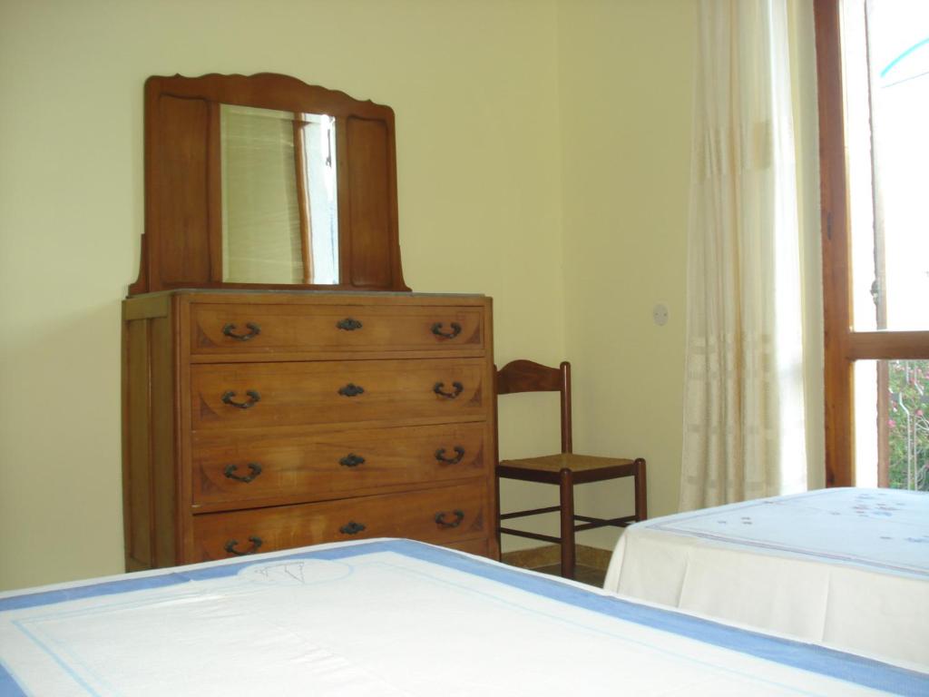 Posteľ alebo postele v izbe v ubytovaní Casa Degli Oleandri Sul Cortile R6314