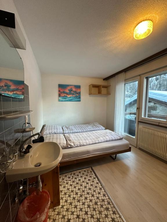 Voodi või voodid majutusasutuse Holiday House Lärchenheim toas