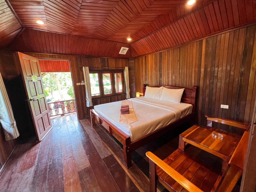 Postel nebo postele na pokoji v ubytování Diamond Beach Resort