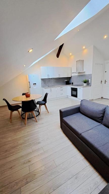 Kuchyň nebo kuchyňský kout v ubytování Landria Home - appartement 1 chambre proche de la Gare de reims centre