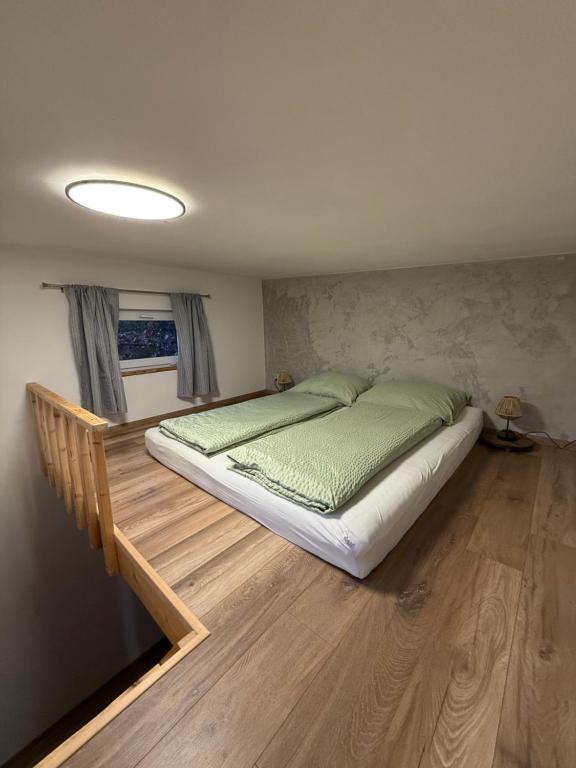 Postel nebo postele na pokoji v ubytování Kousek klidu pod skálou