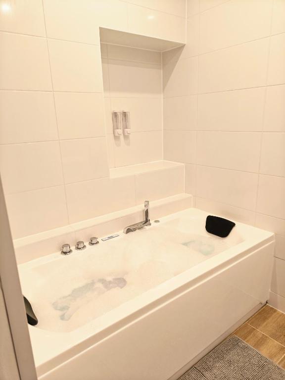 Koupelna v ubytování Zen lodge jacuzzi privé
