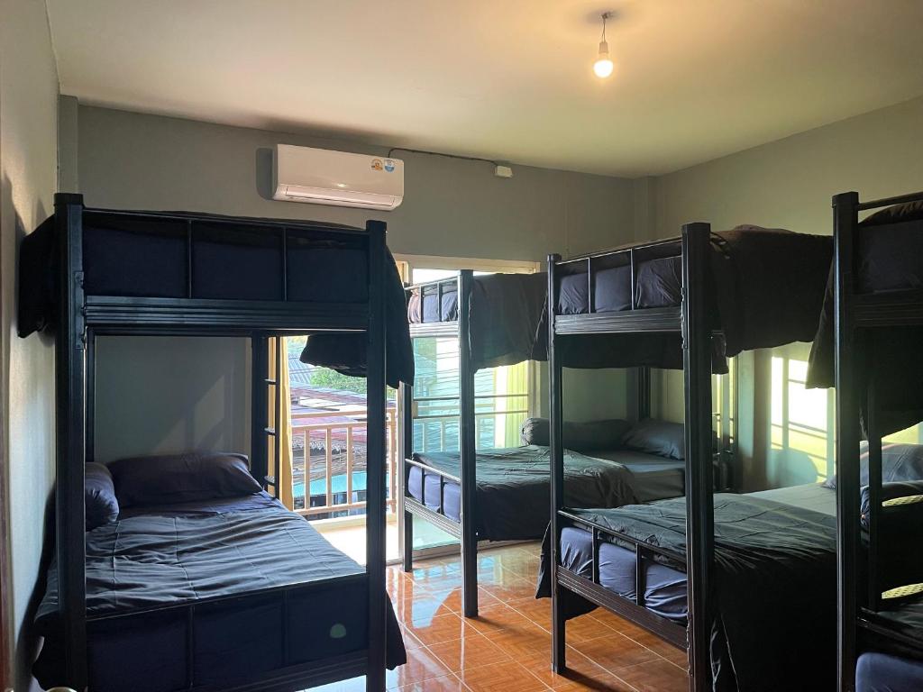 Postel nebo postele na pokoji v ubytování Poppy hostel