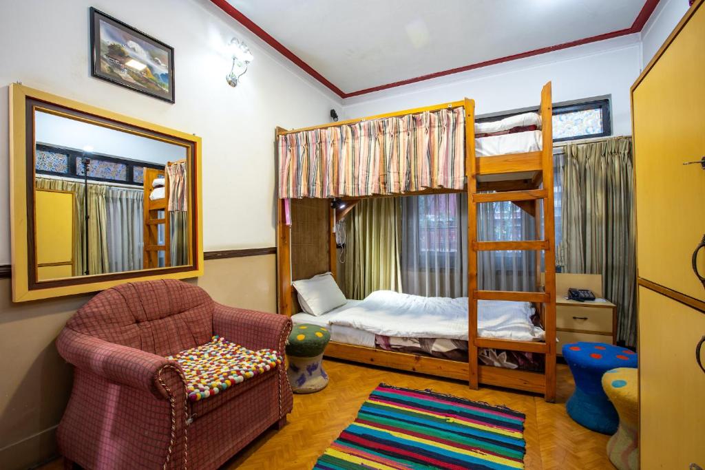 Postel nebo postele na pokoji v ubytování Shangrila Boutique Hotel