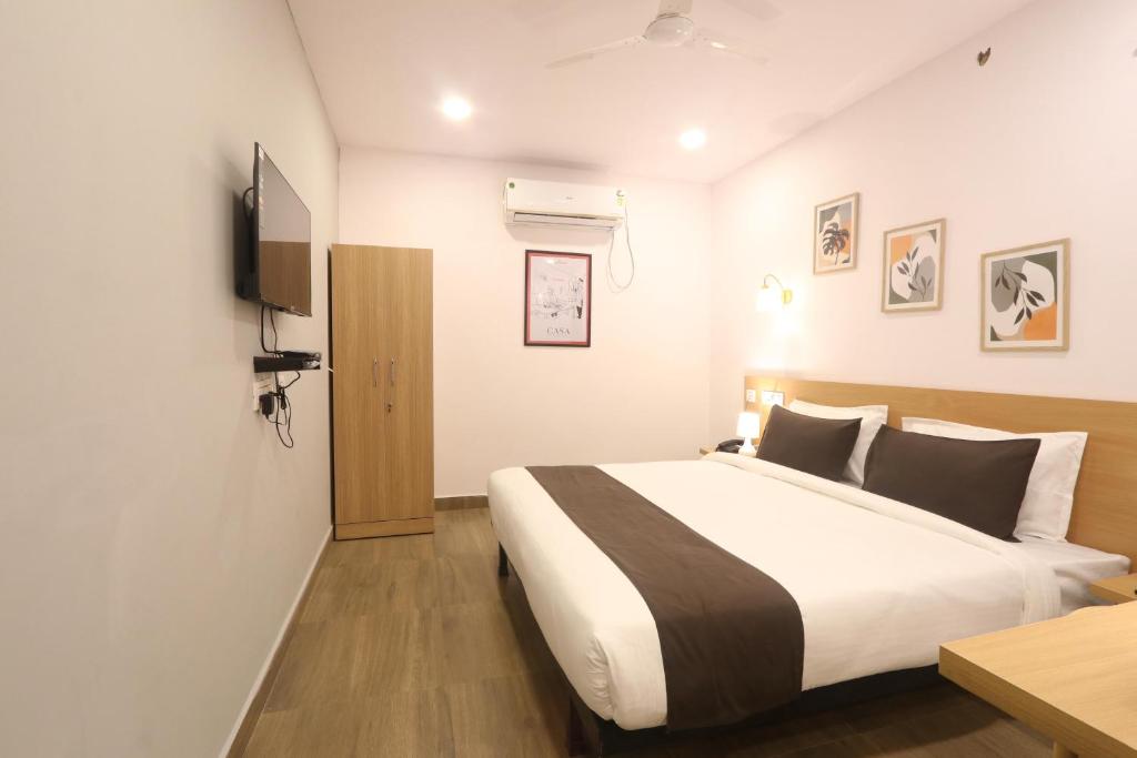 Postel nebo postele na pokoji v ubytování Casa Hotel