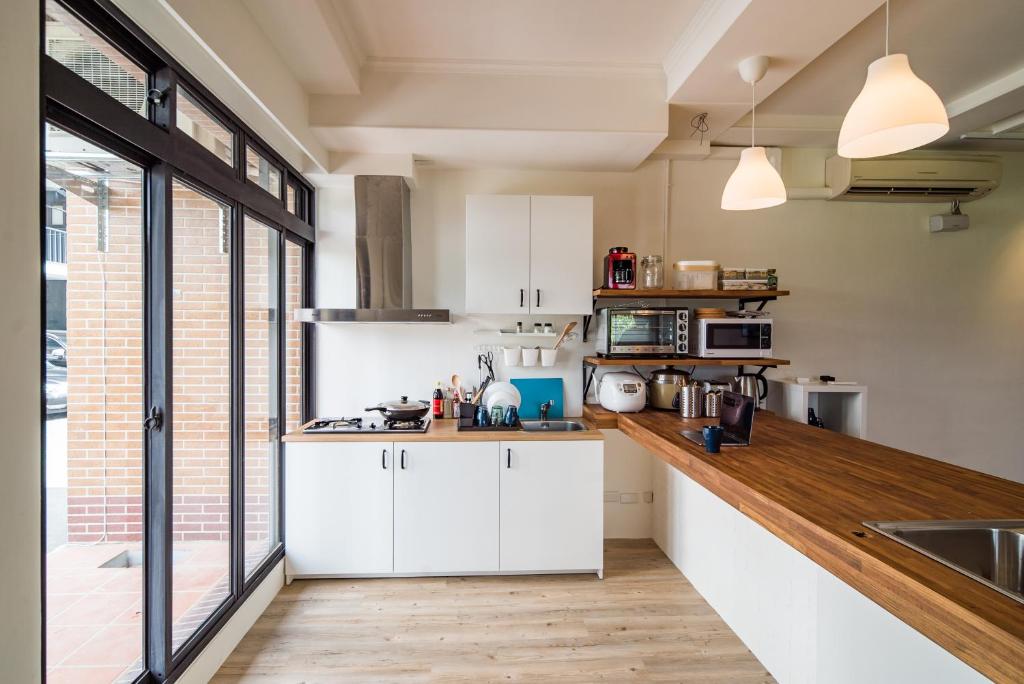 Kuchyň nebo kuchyňský kout v ubytování Dongshan Yi Hostel