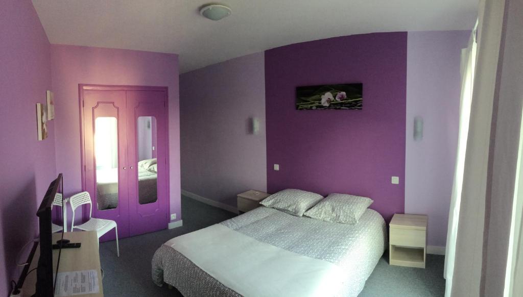 Postel nebo postele na pokoji v ubytování Hôtel du Littoral