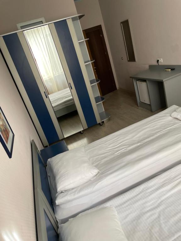 Postel nebo postele na pokoji v ubytování Hotel Tasty Tbilisi