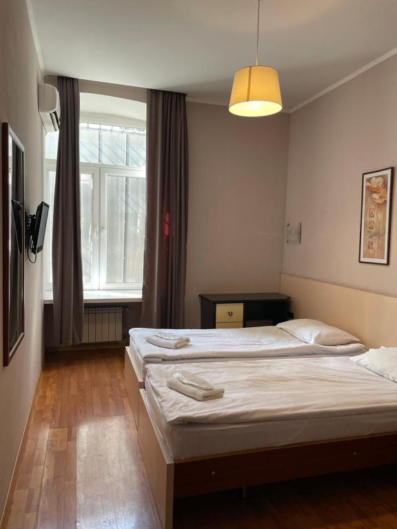 Postel nebo postele na pokoji v ubytování Hotel Tasty Tbilisi
