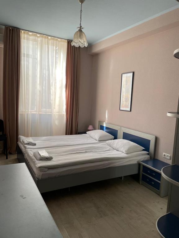 Postel nebo postele na pokoji v ubytování Hotel Tasty Tbilisi