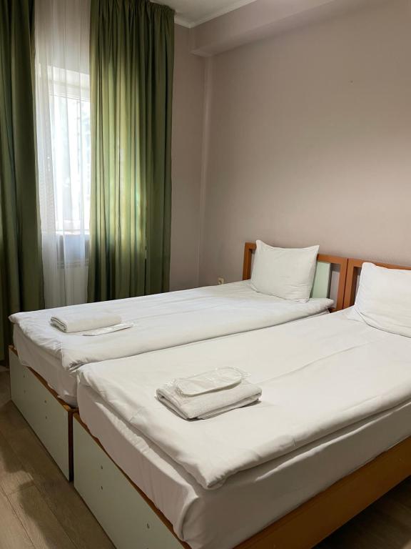 Postel nebo postele na pokoji v ubytování Hotel Tasty Tbilisi
