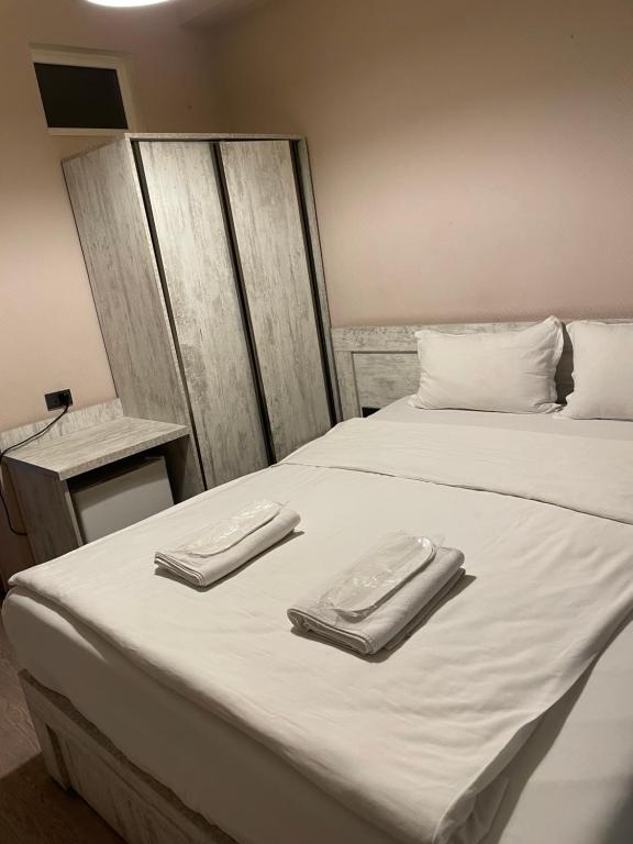 Postel nebo postele na pokoji v ubytování Hotel Tasty Tbilisi