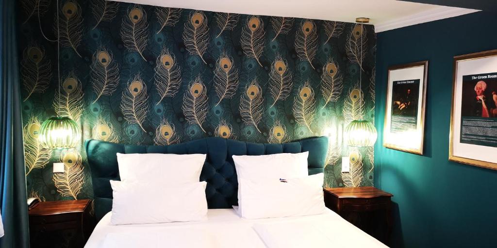 Postel nebo postele na pokoji v ubytování Boutique Hotel & Bio Wirtshaus Schwarzer Bock